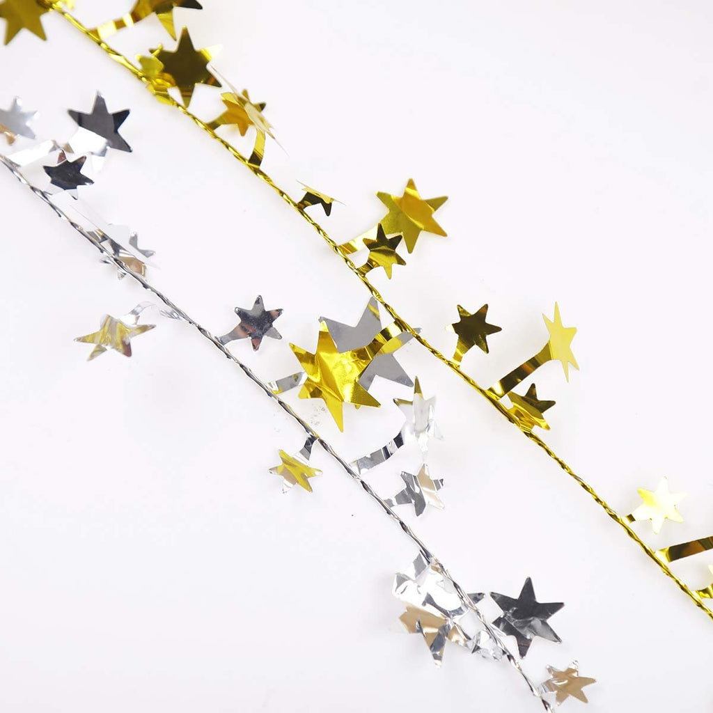 Two strands of star tinsel garland, one gold and one silver, on a white background.