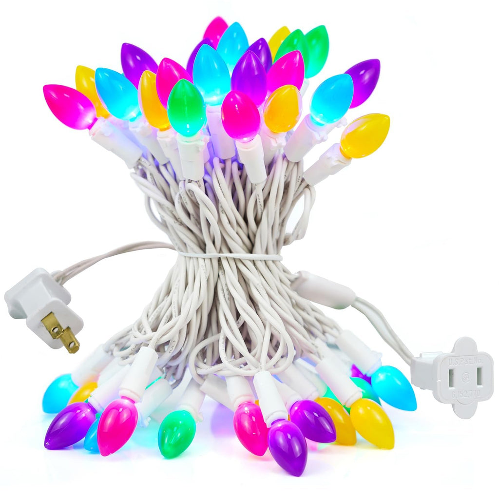 Bunch of multicolor LED string lights with white wire and plug on a white background