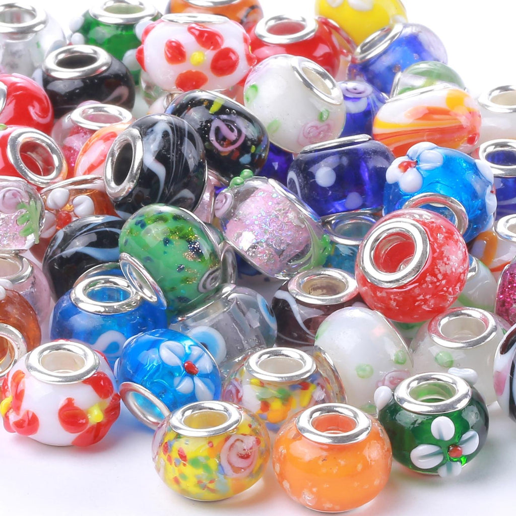 Pile of assorted colorful Murano glass large hole beads with silver-plated cores for jewelry making.