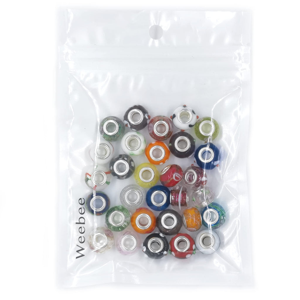 Assorted Murano glass large hole beads in a clear plastic bag, featuring various colors and patterns.