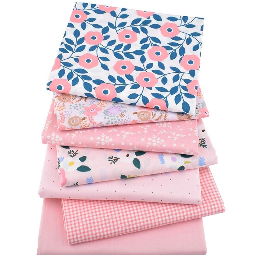 Stack of six floral print 100% cotton fabric squares in various pink and white patterns, angled view.
