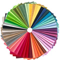 Fan of 50 solid color 10x10 inch 100% cotton fabric squares arranged in a circle