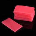 Stack of watermelon red diamond painting wax clay pieces on a black background