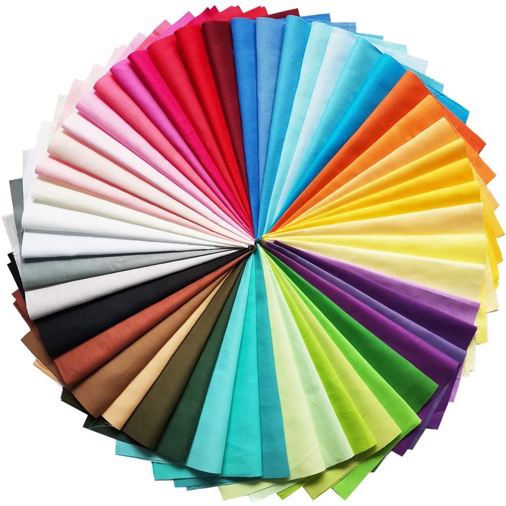 Fan of 50 precut solid color cotton fabric squares on a white background