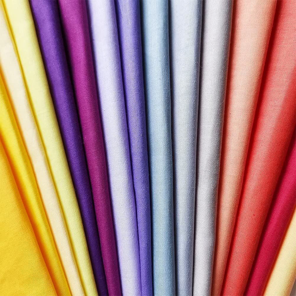 Fan of precut solid color cotton fabric squares in various shades of yellow, purple, blue, gray, orange, and pink.