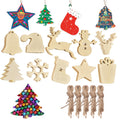 Assortment of unfinished wooden Christmas ornaments including bells, Santa hats, reindeer, snowmen, trees, snowflakes, stockings, stars, and gift boxes, with twine and colorful bells.