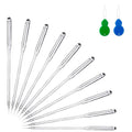 Set of sewing machine needles and two threaders on a white background