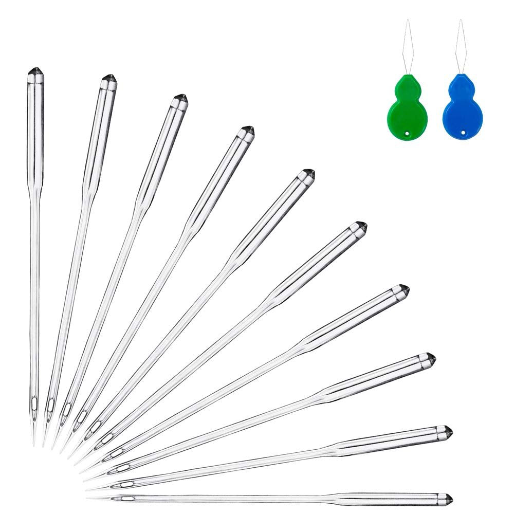 Set of sewing machine needles and two threaders on a white background
