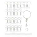 Silver split round keychain rings with chains and jump rings arranged in rows on a white background.