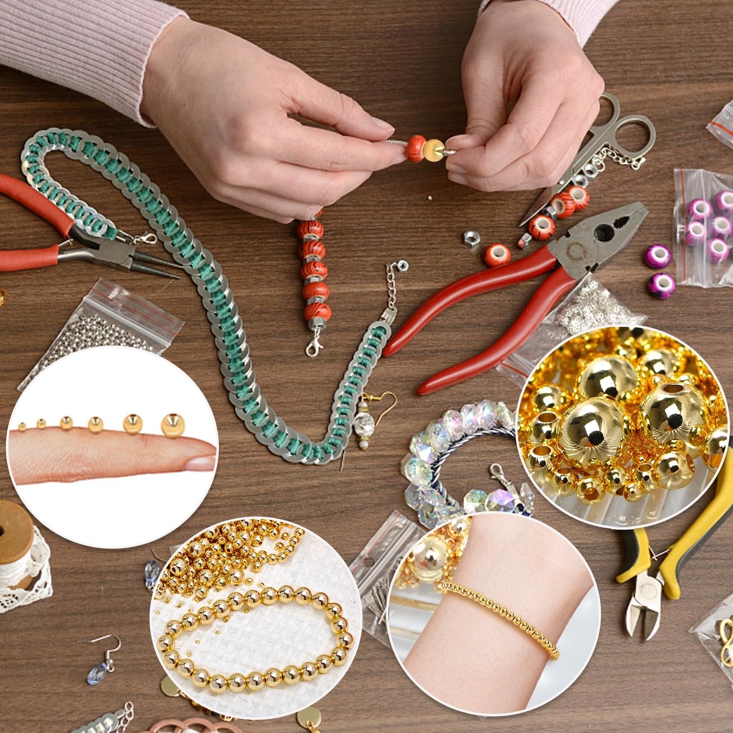 Hands crafting jewelry with gold spacer beads, pliers, scissors, and various bead projects on a wooden table.