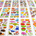 Sheets of puffy stickers featuring dinosaurs, animals, vehicles, and fruit on a white background.