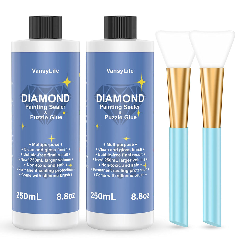 Two bottles of diamond painting sealer and puzzle glue with silicone brushes on a white background.