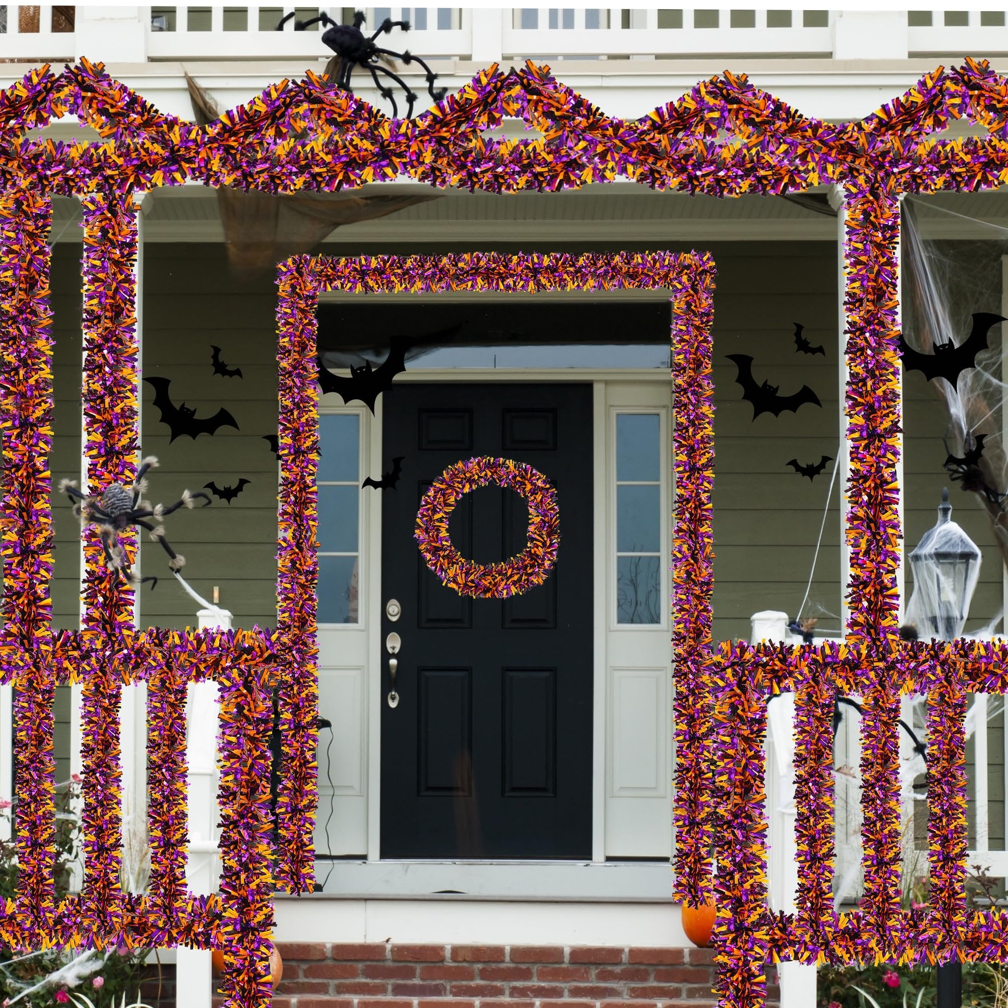 Halloween tinsel garland in orange, black, and purple decorating a porch with bats and spiders