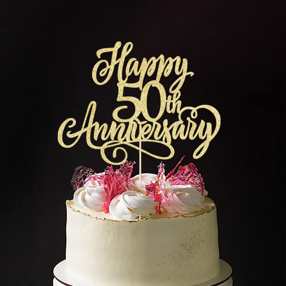 Golden glitter cake topper reading 'Happy 50th Anniversary' on a decorated cake