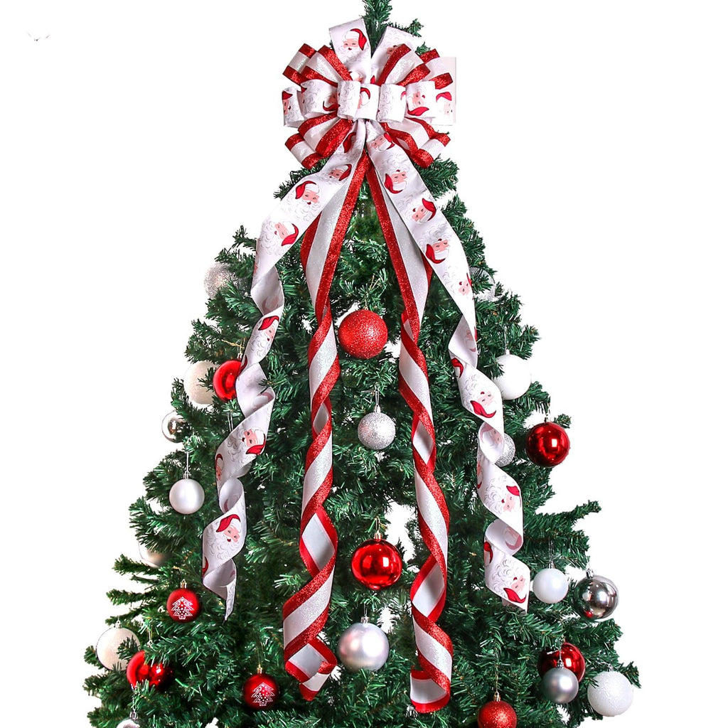 Christmas tree topper bow with Santa Claus patterned ribbon and red and silver ornaments