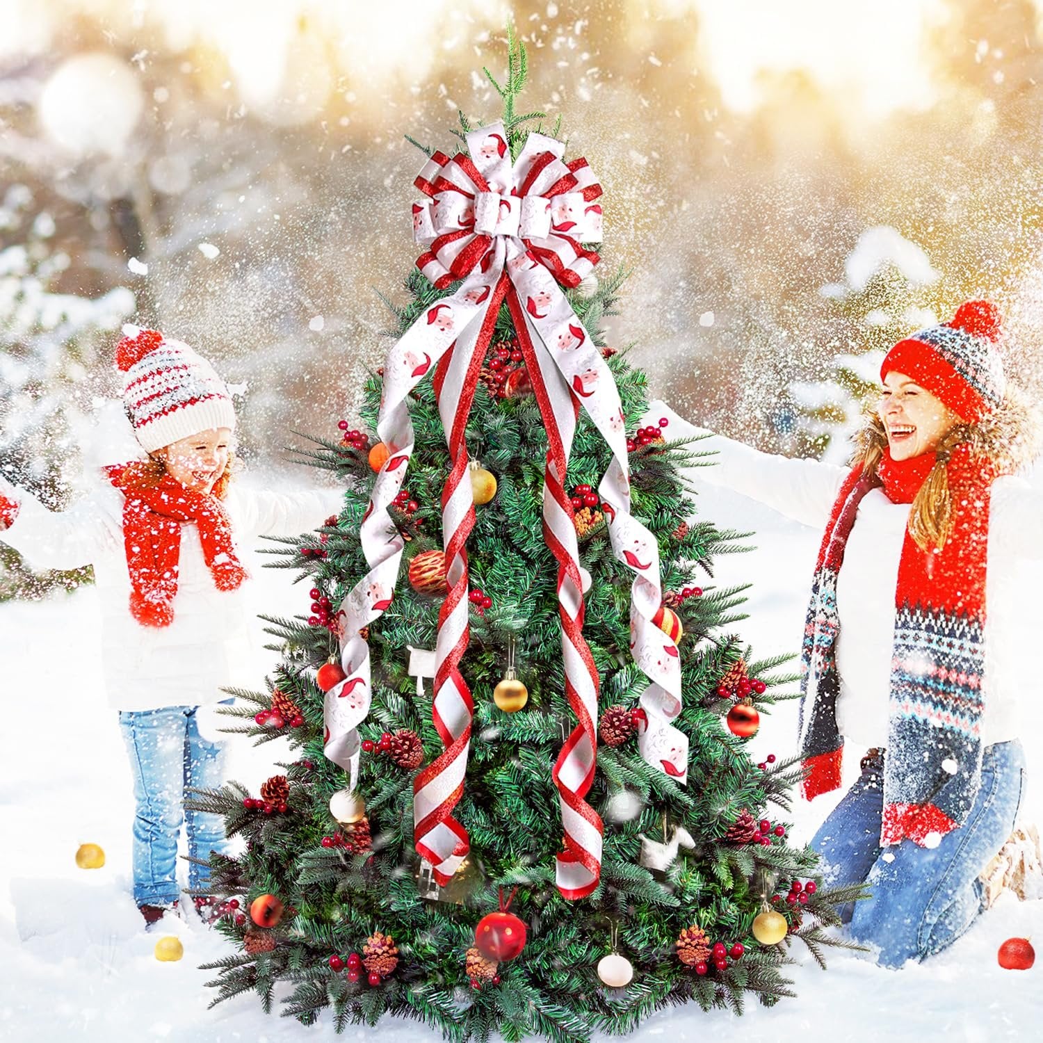 Christmas tree decorated with a large bow and ribbon featuring Santa Claus pattern, with a mother and child in the snow.