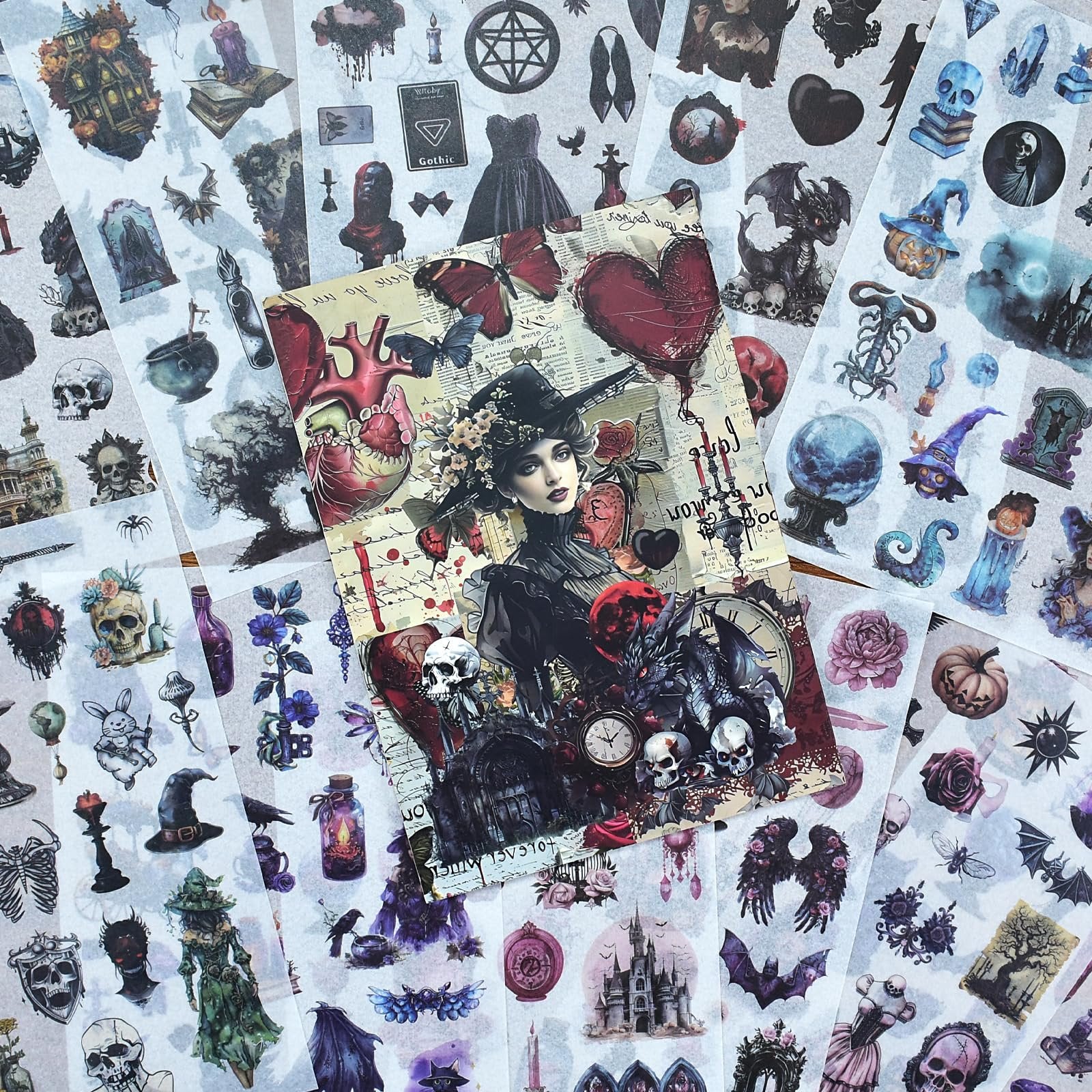 Collage of vintage gothic and floral scrapbook stickers featuring skulls, butterflies, a dragon, a woman in a hat, and various spooky elements.