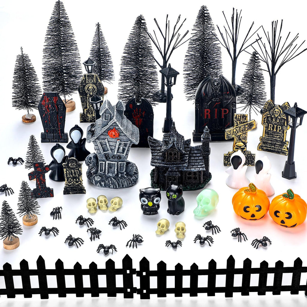 Halloween village accessories set including haunted houses, tombstones, trees, fence, streetlamps, spiders, skulls, ghosts, pumpkins, and owls.