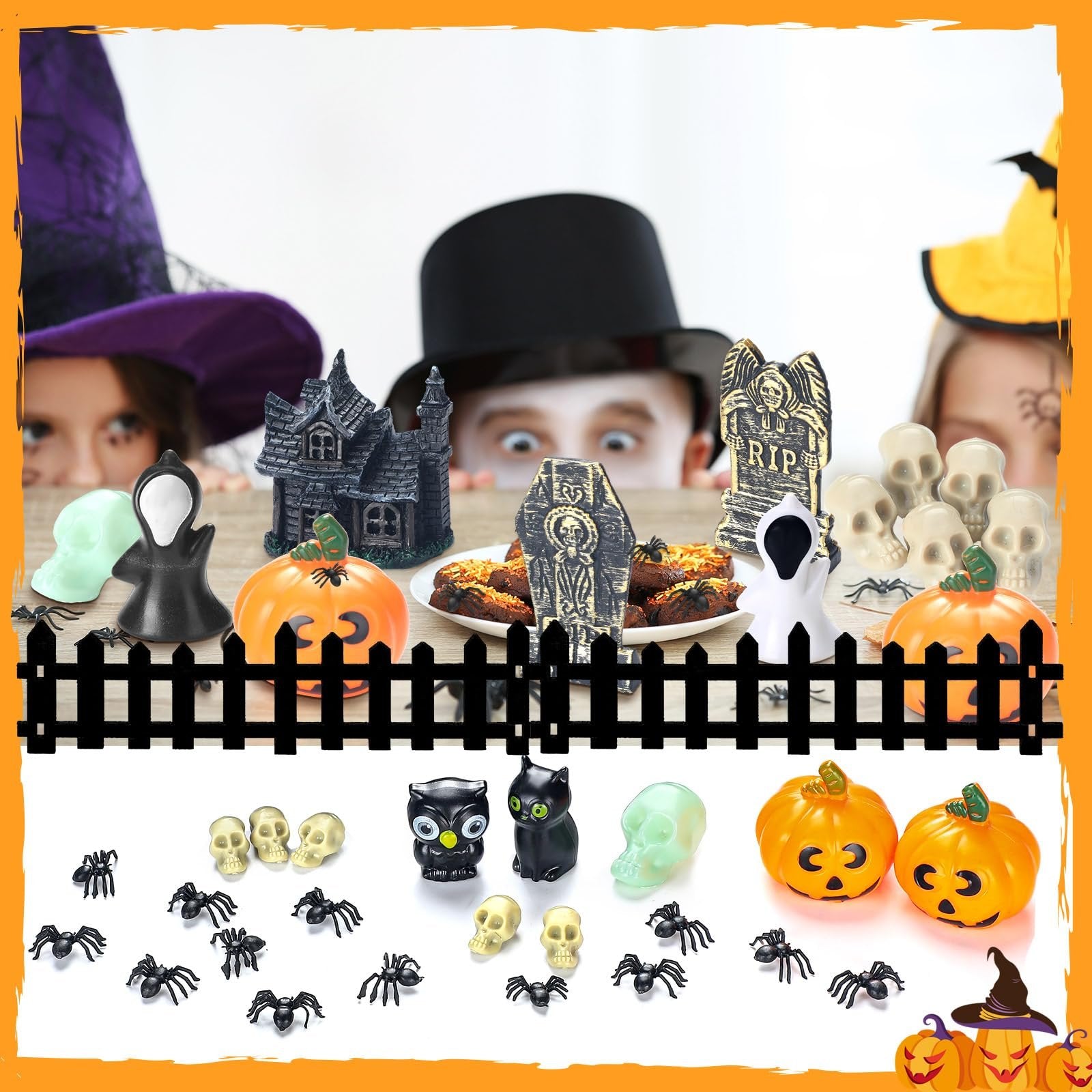 Halloween village accessories set with haunted houses, pumpkins, skulls, spiders, owls, and cats, with children in costumes peeking over a fence.