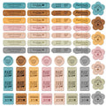 Assortment of 56 artificial leather handmade labels in rectangle, flower, and round shapes, in 7 colors.