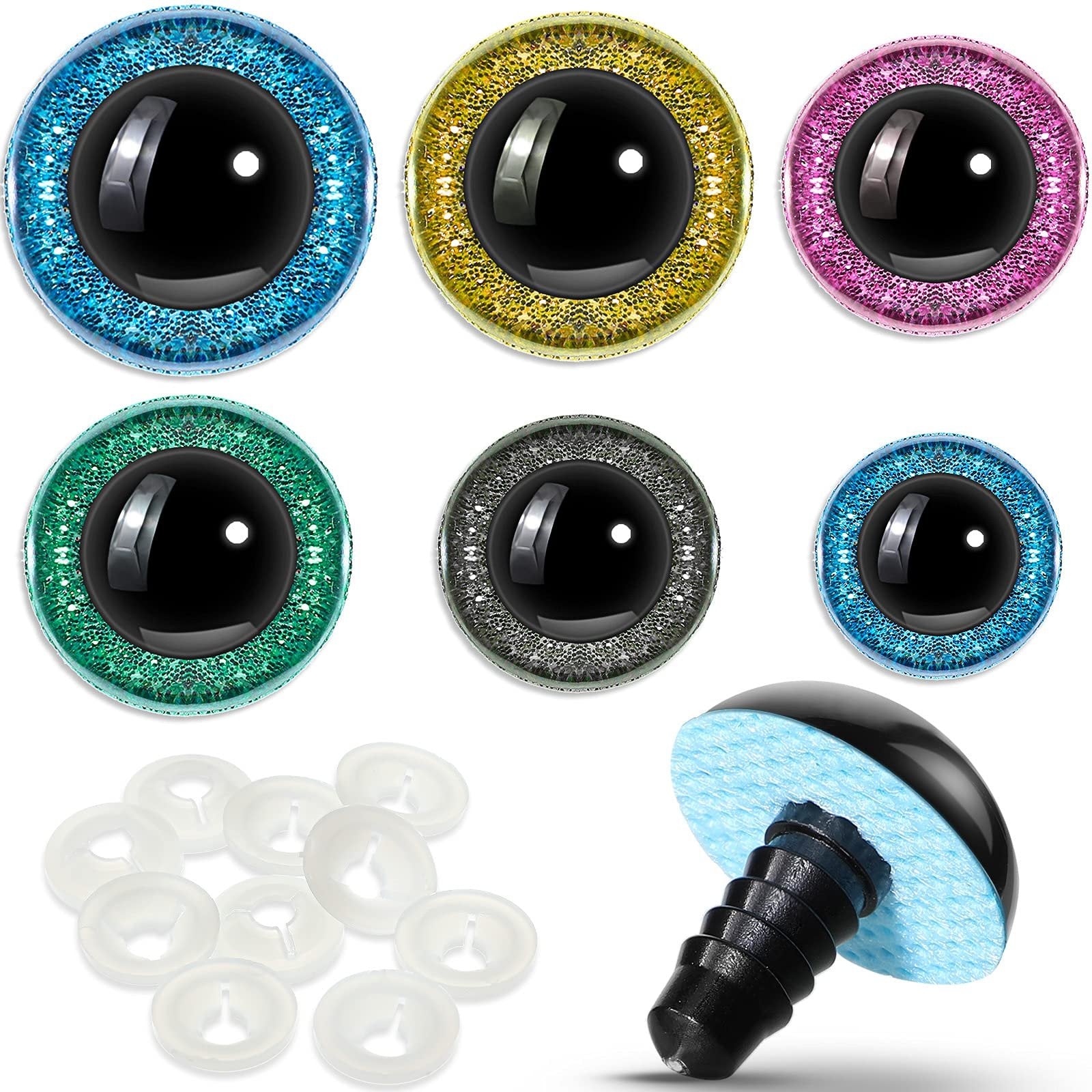 Assorted large plastic safety eyes in blue, gold, pink, green, gray, and smaller blue, with washers and one eye showing its backing and screw.