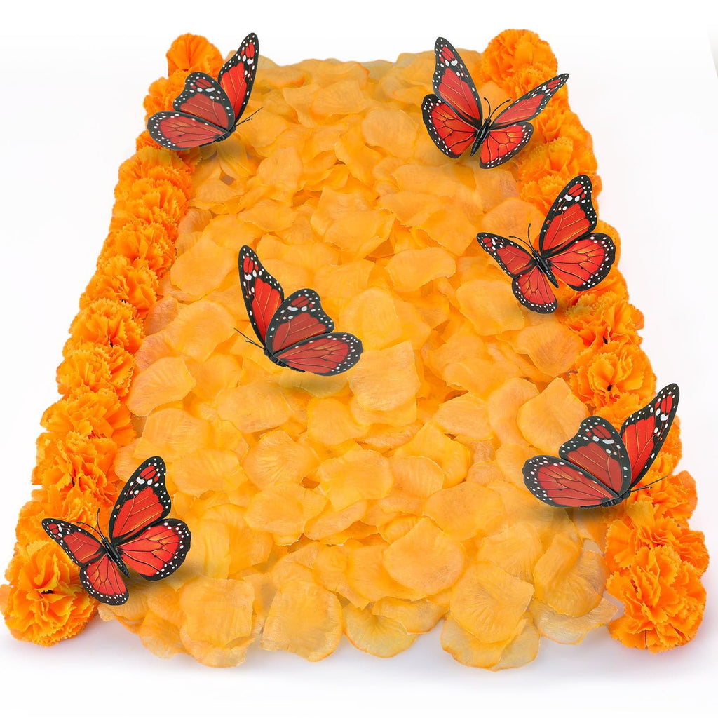 Dia de los Muertos decor set with orange marigold flowers, orange petals, and red butterflies arranged on a white background.