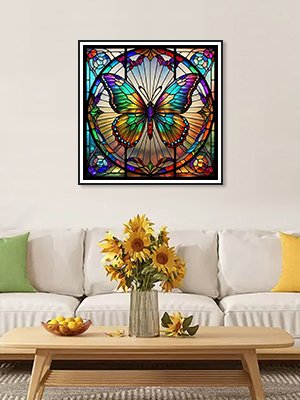Framed 5D butterfly diamond painting art hanging on a wall above a sofa and coffee table with sunflowers.