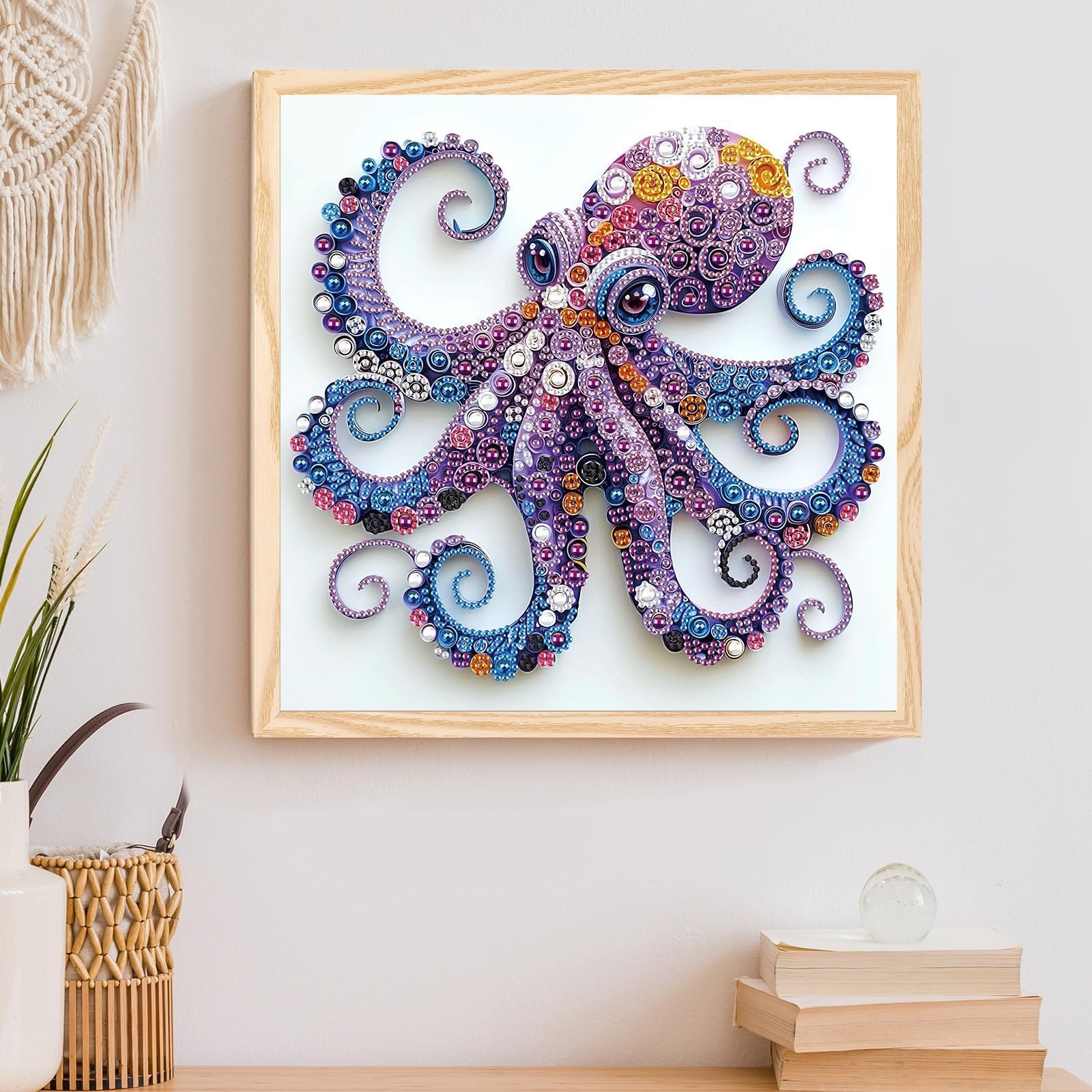 Framed diamond art painting of a colorful octopus with intricate details, displayed on a white wall.
