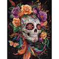 Diamond painting kit featuring a decorated skull adorned with colorful flowers, feathers, and a butterfly.