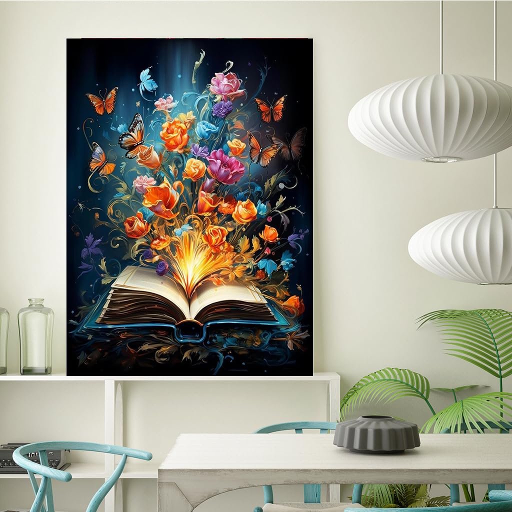 Open book with colorful flowers and butterflies emerging from pages, displayed in a modern room setting.