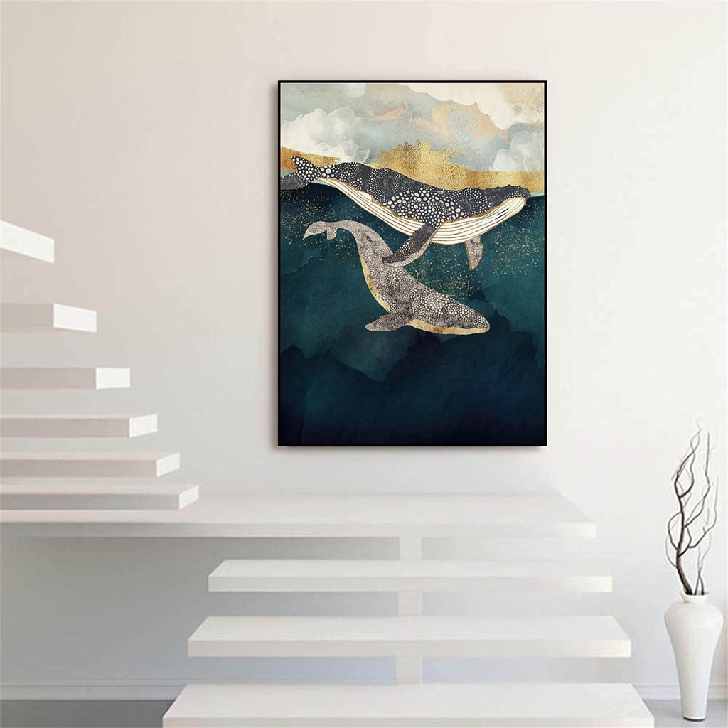 Abstract painting of two whales swimming in dark blue water with gold and cloudy sky background.