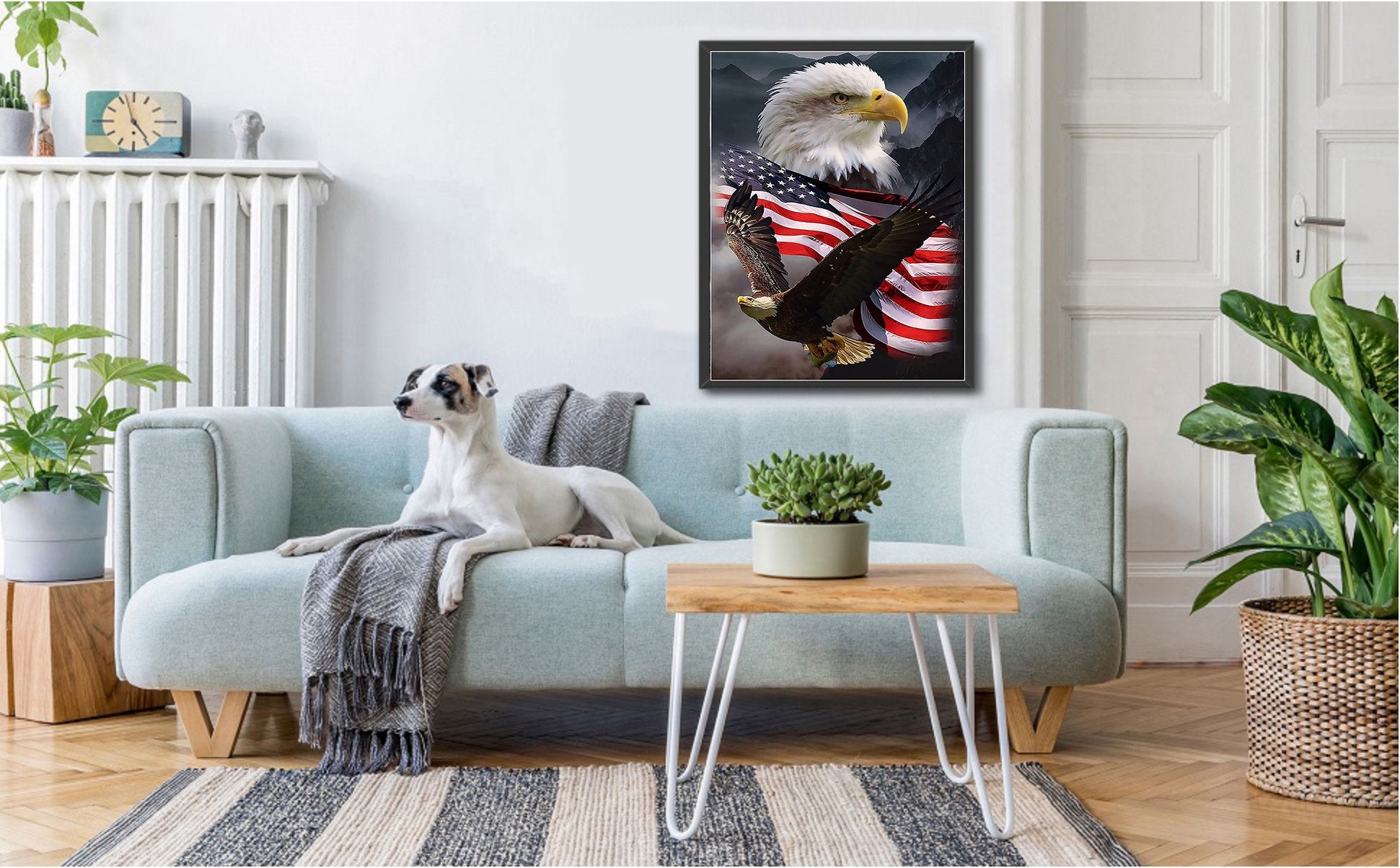 Diamond painting of an eagle and American flag displayed in a living room setting with a dog on a sofa.