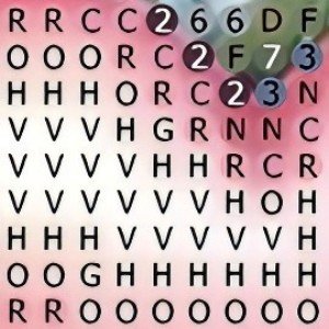 Diamond painting canvas grid with letters and numbers, close-up view