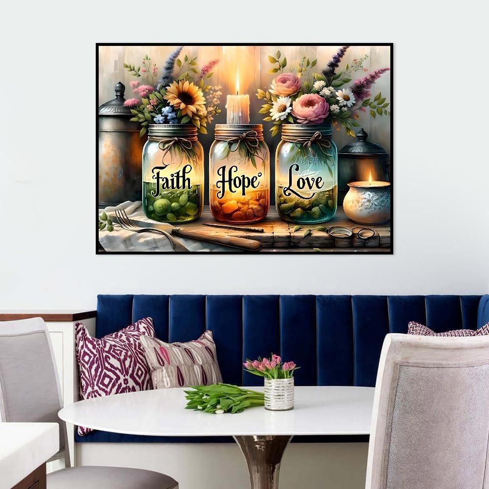 Diamond painting kit showing three mason jars with 'Faith', 'Hope', and 'Love' text, filled with green beads, orange beads, and blue beads respectively, adorned with flowers and lit candles.