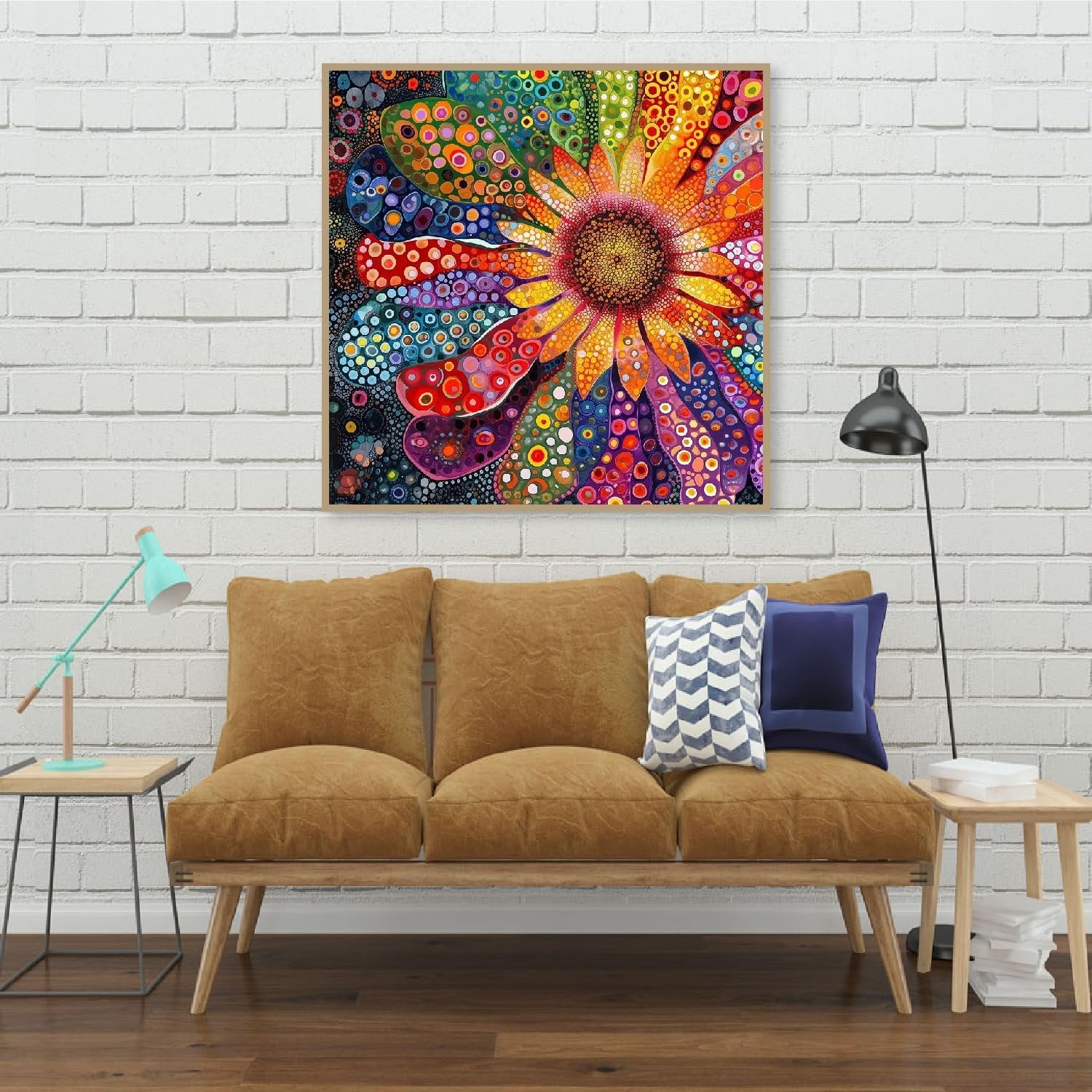 Framed abstract flower diamond painting hanging on a white brick wall above a sofa