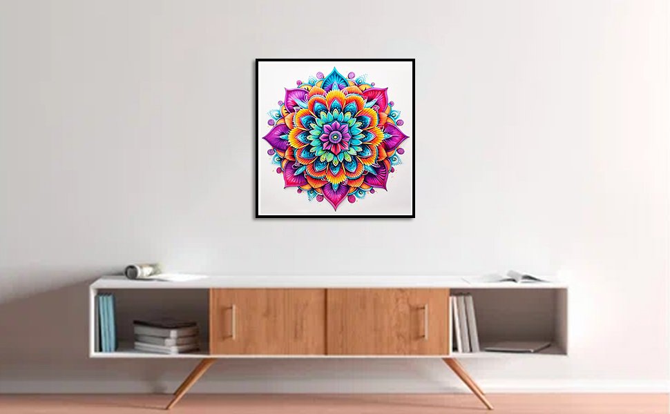 Framed colorful mandala diamond painting art displayed on a white wall above a modern credenza.