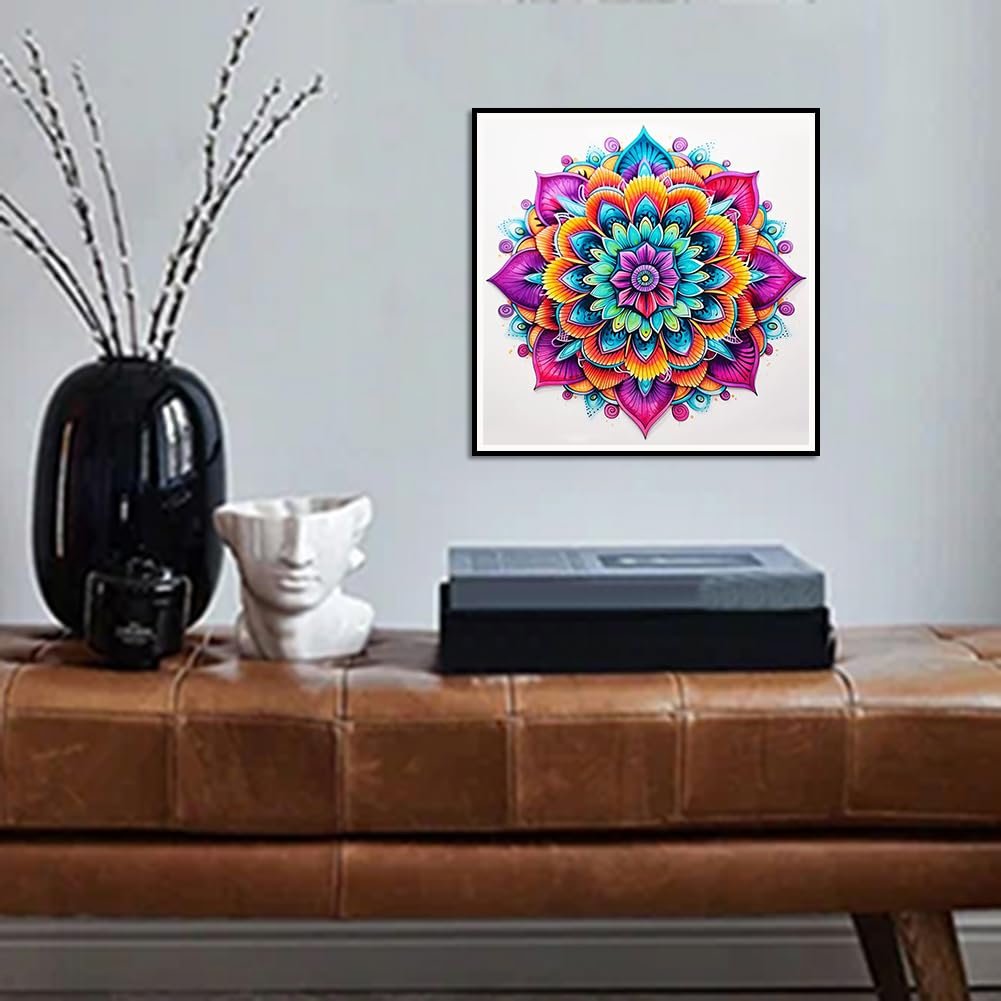 Framed colorful mandala diamond painting hanging on a wall above a leather bench with decorative items.