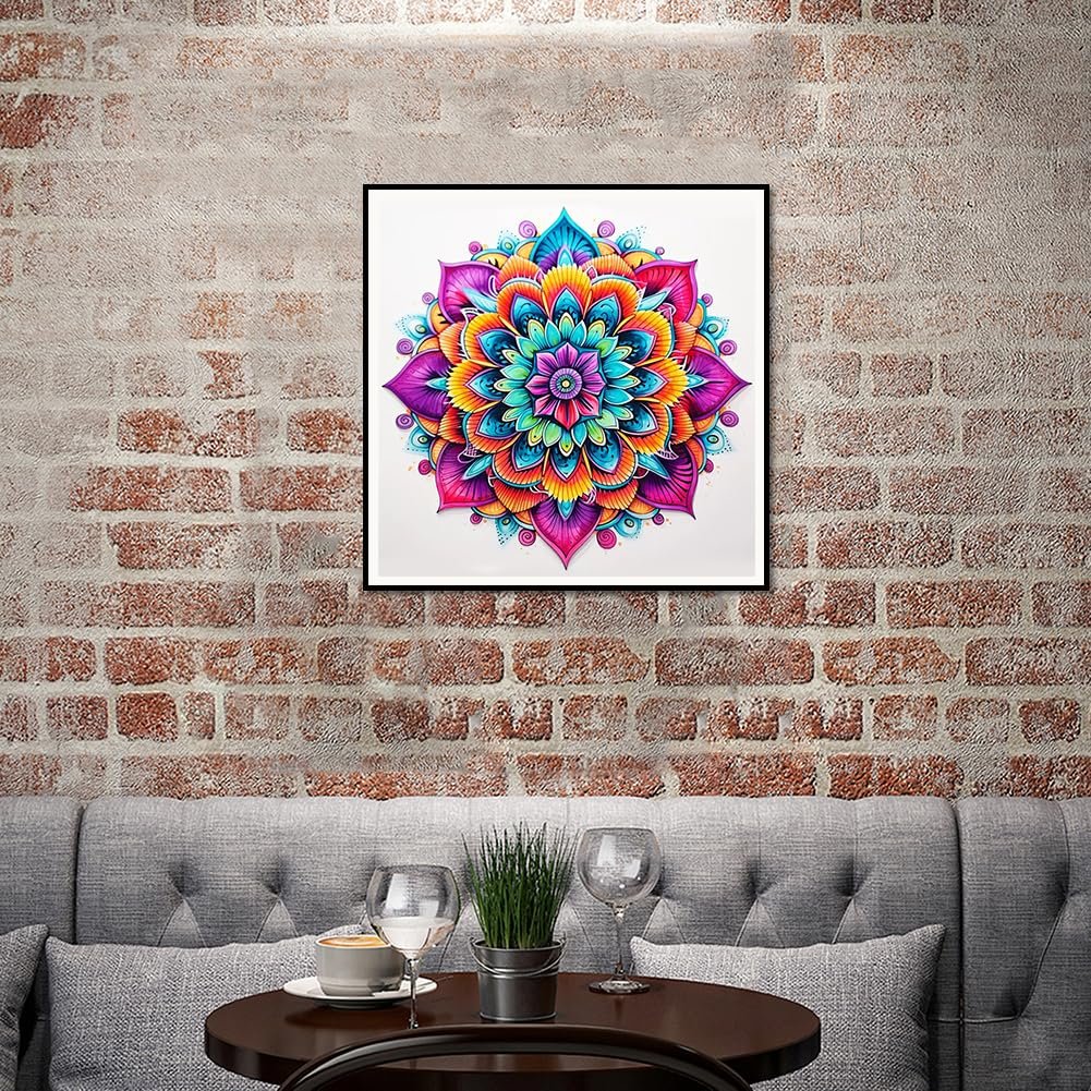 Framed colorful mandala diamond painting art hanging on a brick wall above a sofa and coffee table.