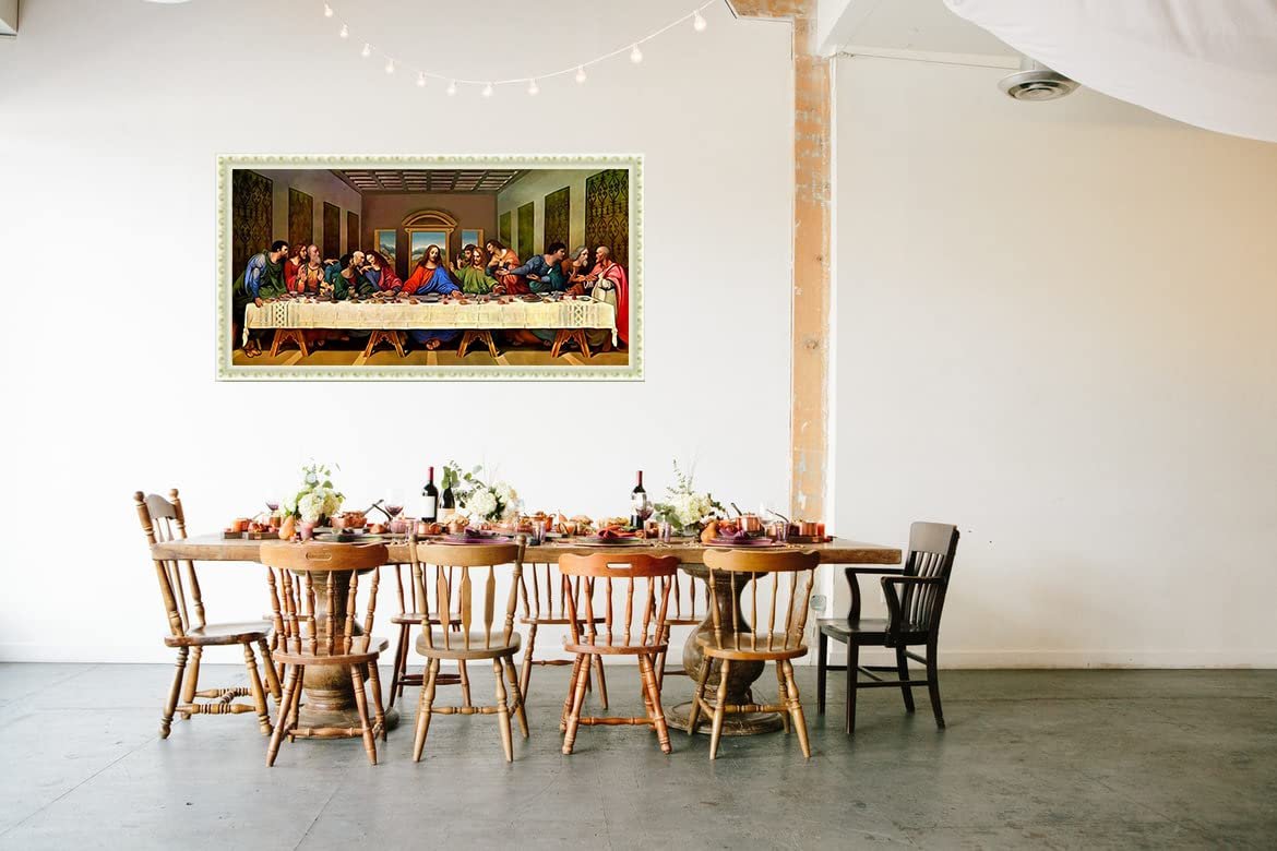 Diamond painting of The Last Supper hanging above a dining table set for a meal.