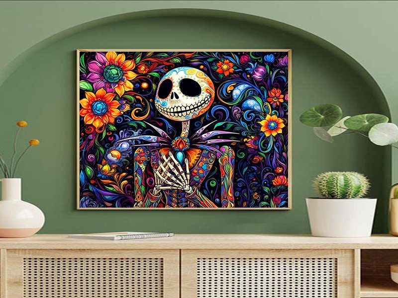 Diamond art painting of a skeleton with colorful flowers and patterns, framed and displayed on a shelf.