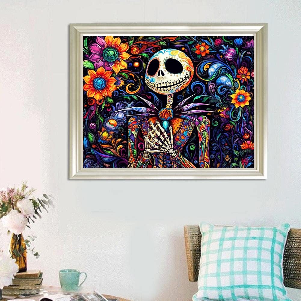 Framed diamond art painting of a colorful skeleton surrounded by flowers, displayed on a wall.