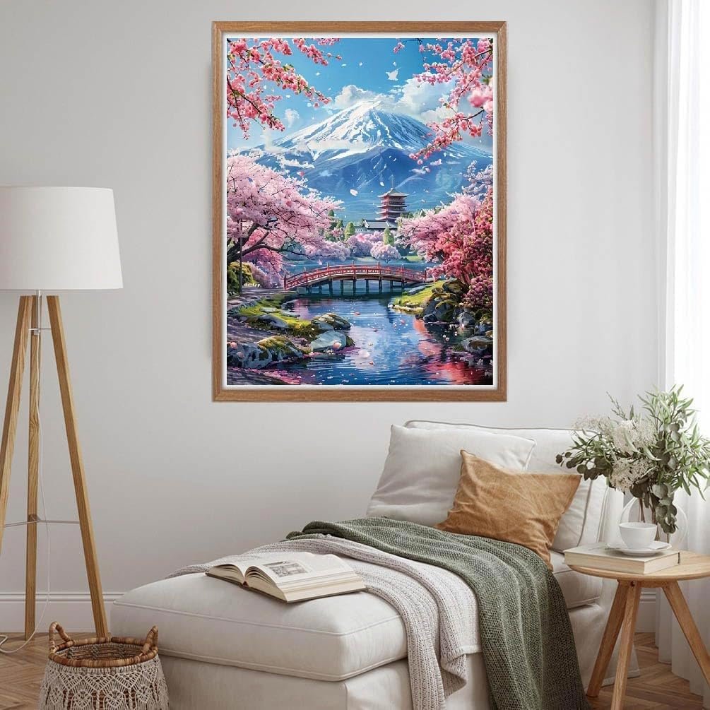 Diamond painting kit showing Mount Fuji, a pagoda, and cherry blossoms over a bridge and stream.