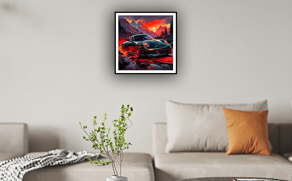 Framed diamond art painting of a black sports car driving through a mountain landscape at sunset