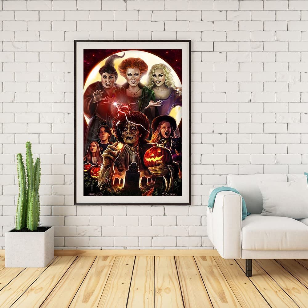 Framed Halloween-themed diamond painting art featuring characters from Hocus Pocus and a scarecrow, displayed on a white brick wall above a couch.