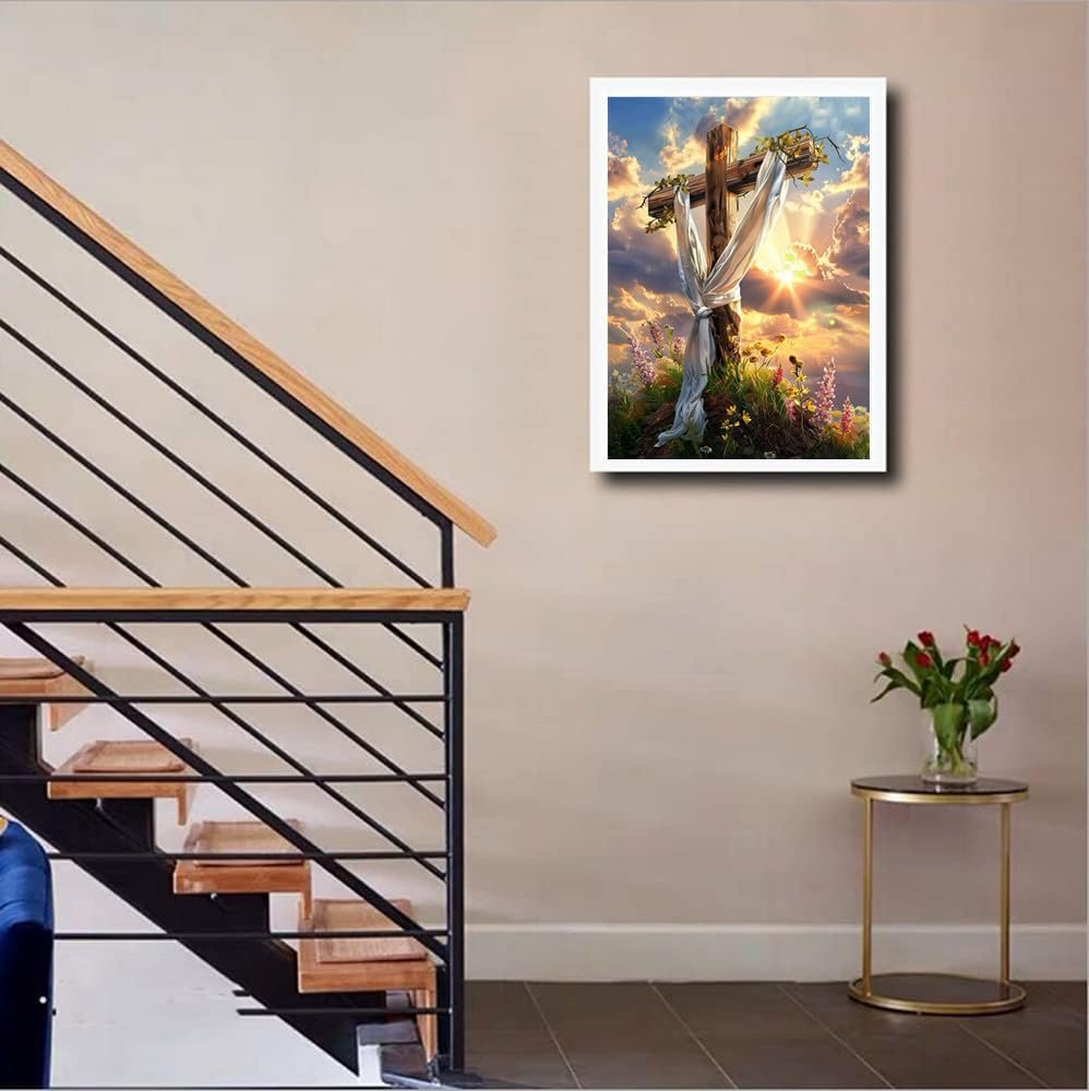 Diamond painting kit featuring a wooden cross with draped white cloth, surrounded by flowers and a sunset sky.
