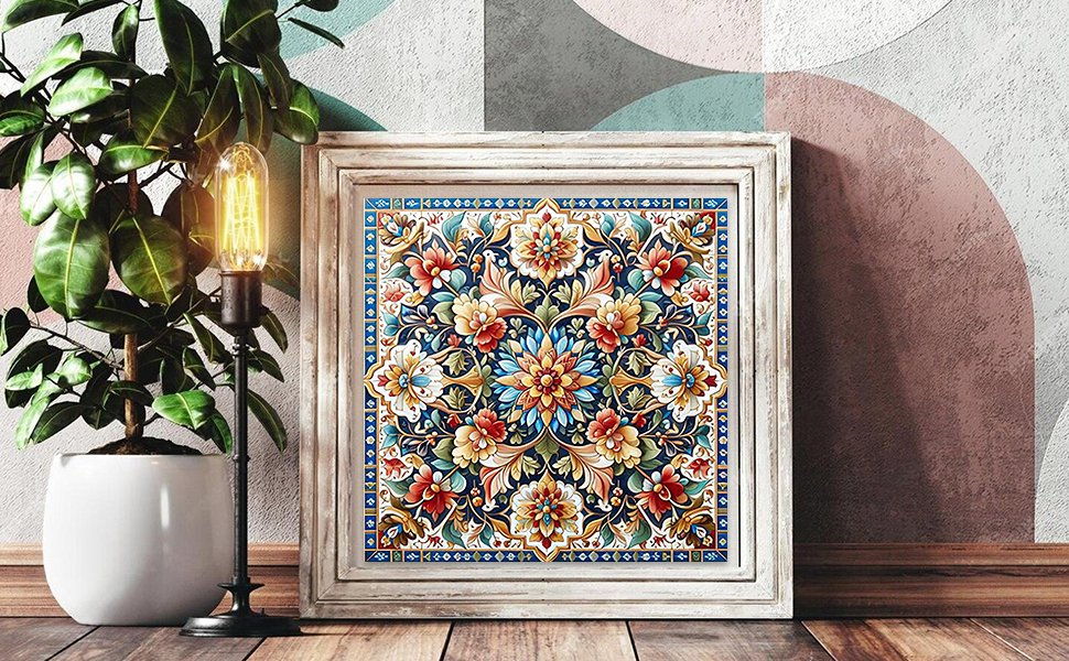 Framed 5D mandala diamond painting kit with floral pattern, displayed next to a potted plant and lamp.