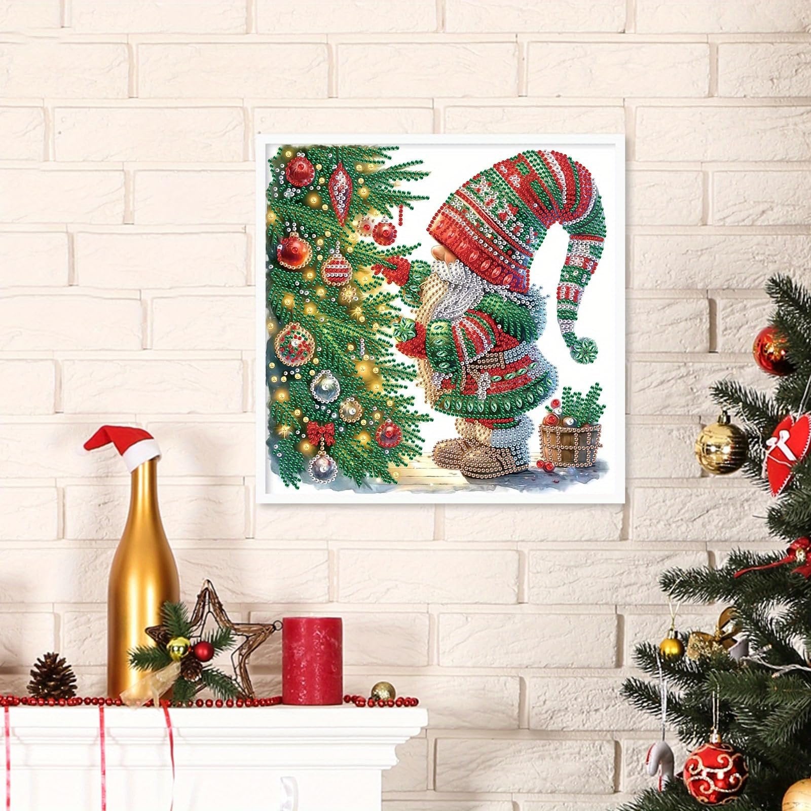 Diamond painting kit featuring a gnome decorating a Christmas tree, displayed on a mantelpiece with festive decorations.