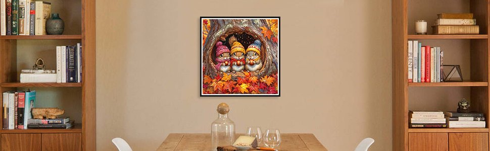 Diamond painting of three squirrels in hats inside a tree hollow surrounded by autumn leaves
