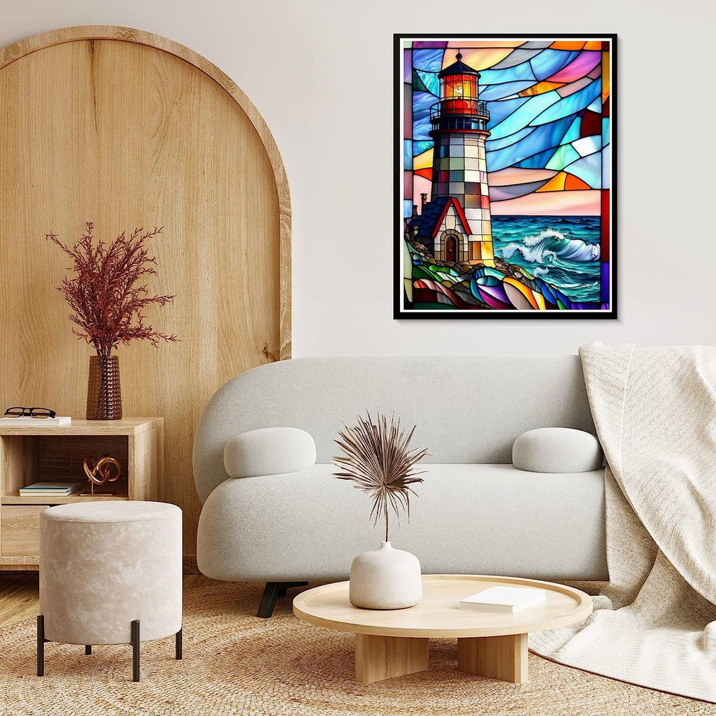 Stained glass lighthouse painting hanging on a wall above a sofa in a living room setting.