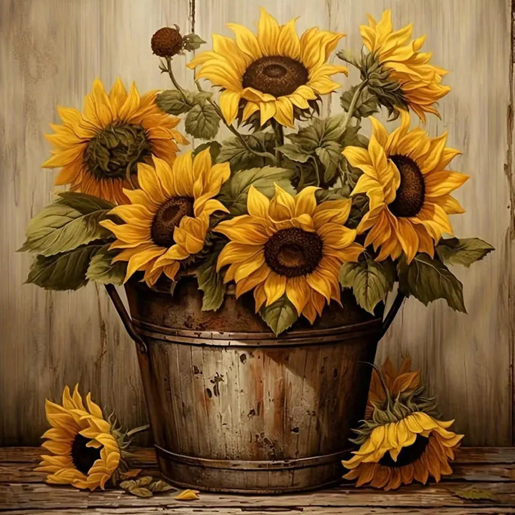 Vase of sunflowers in a rustic bucket against a wooden background, with sunflowers on the table